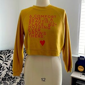 Mustard yellow crop top sweater.